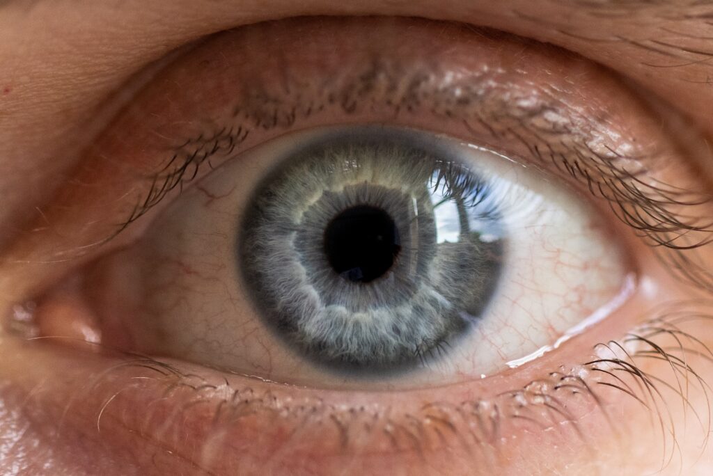 persons eye in close up photography