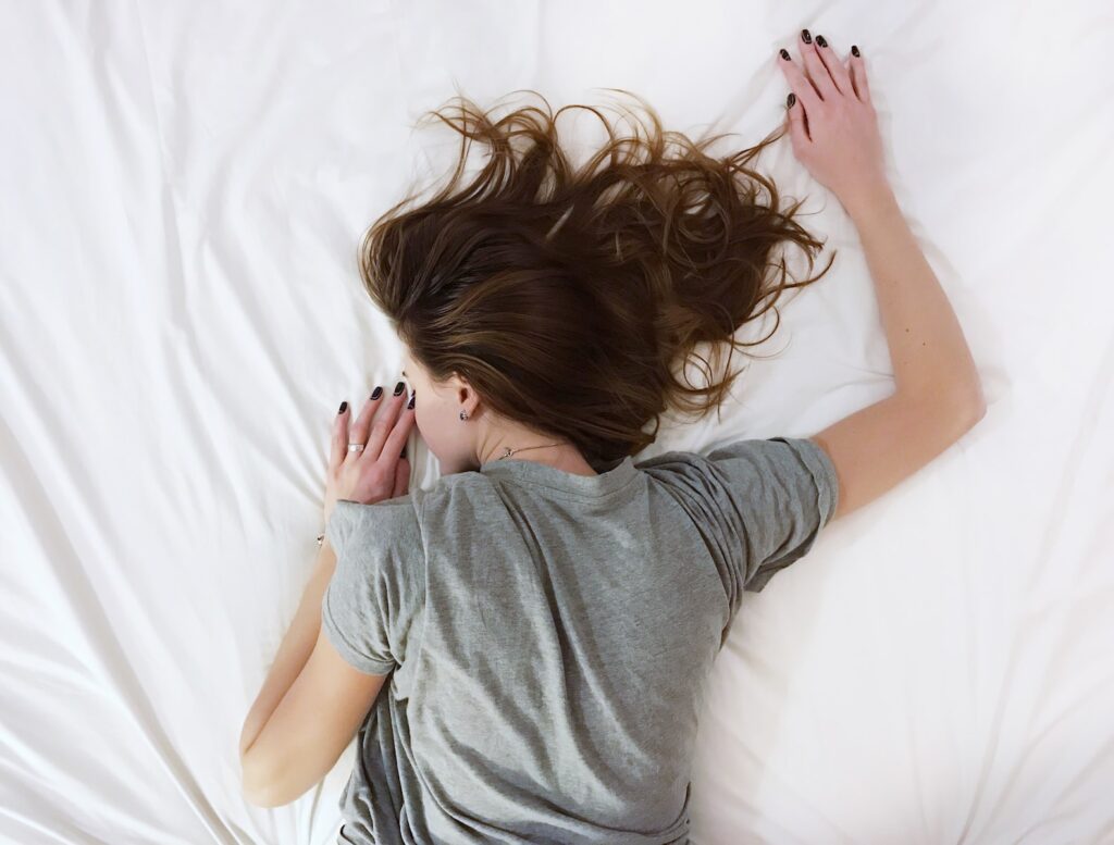 Woman laying on bed