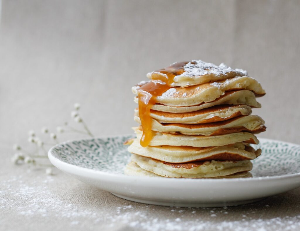 brown pastry on white ceramic plate