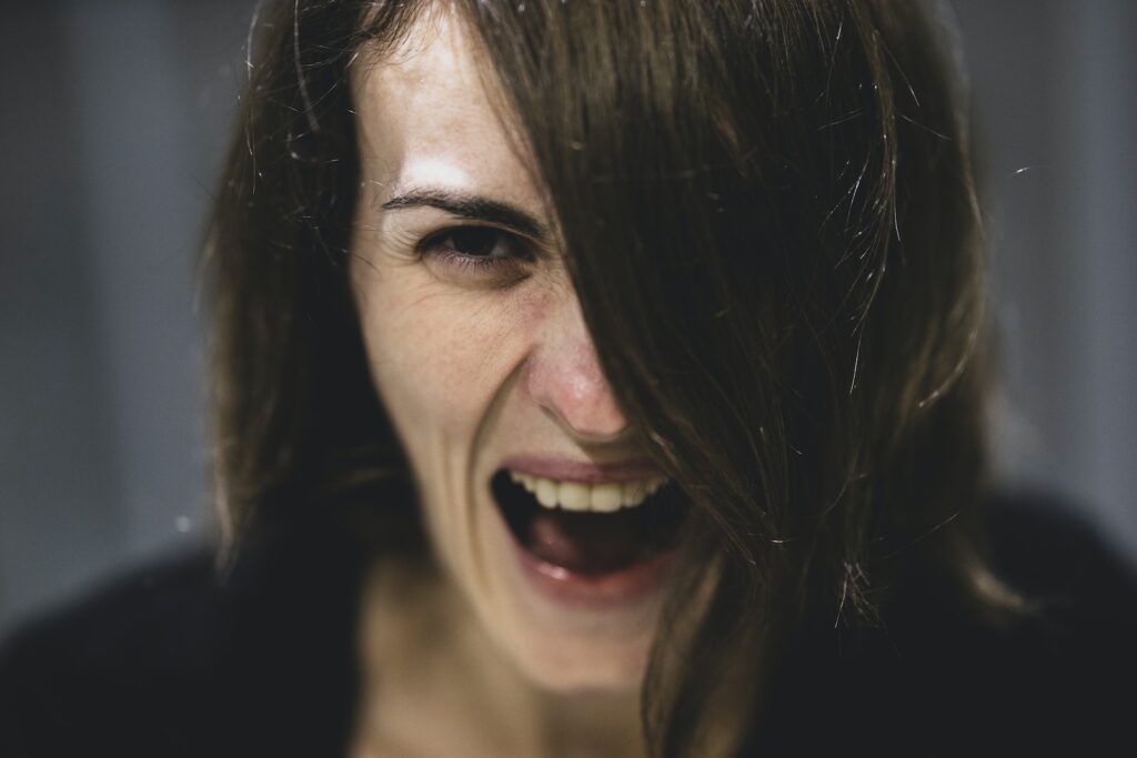 woman with black hair smiling