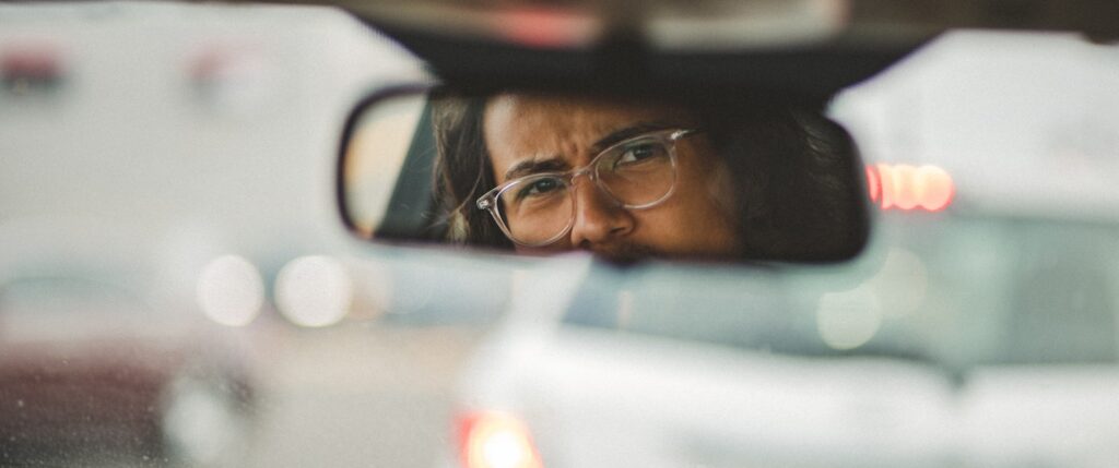 man in black framed eyeglasses