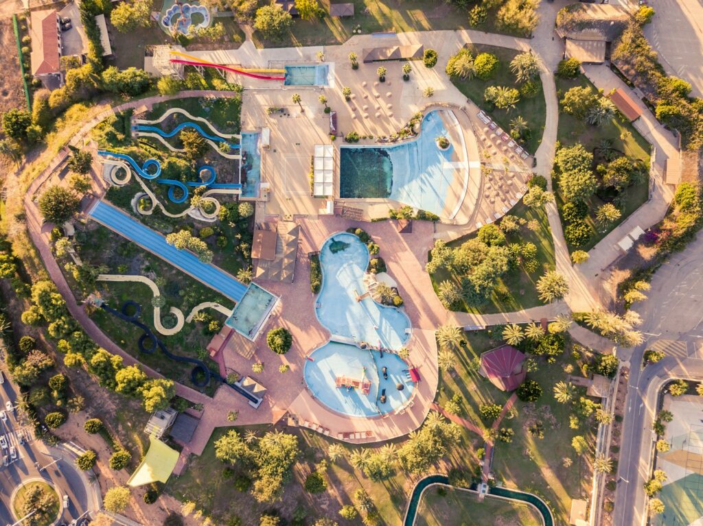 aerial view of park with swimming pools